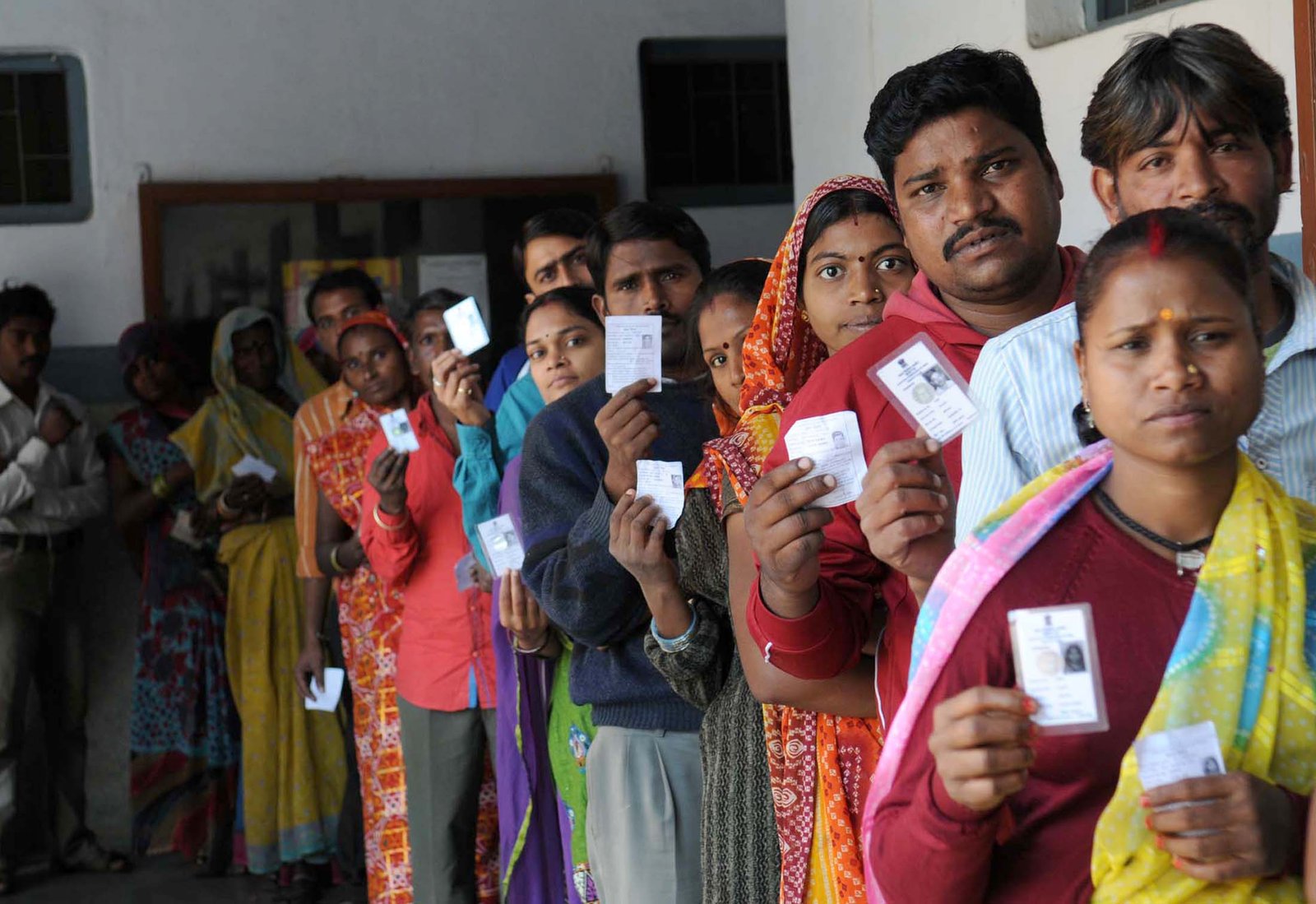 Voters showing identification at the booth