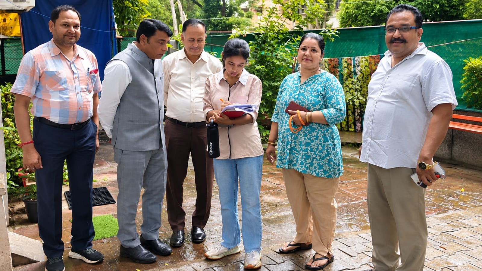 Team meeting residents during a door-to-door outreach visit